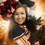 Shirk-Photography-Iowa-Senior-Girl-Portraits-Creative-Sun-Burst-Cheer-Lights-Sparks-Sport Senior Girl Portraits Sun Burst Cheer Lights Sparks Sport Poms Smile